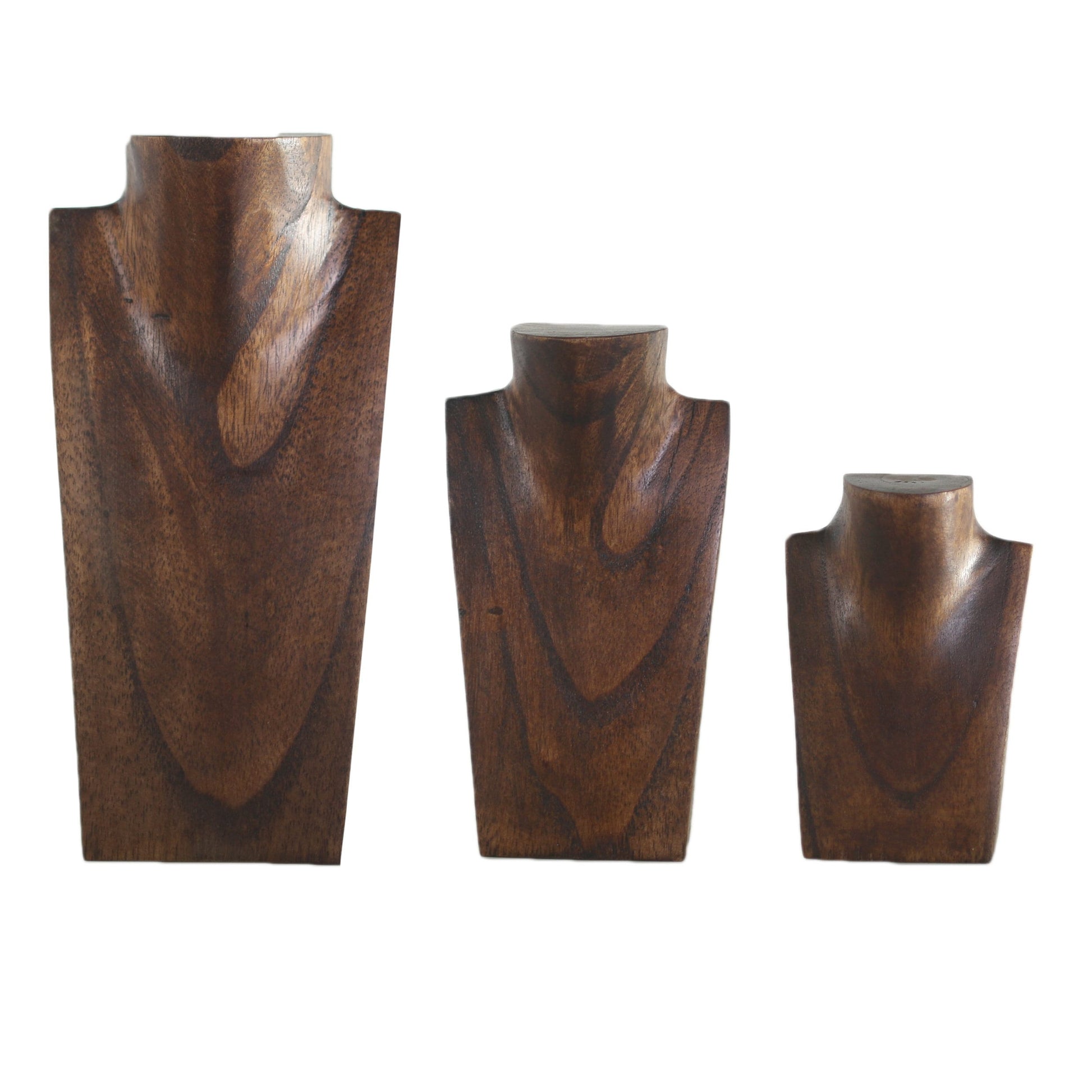 three wooden vases sitting next to each other